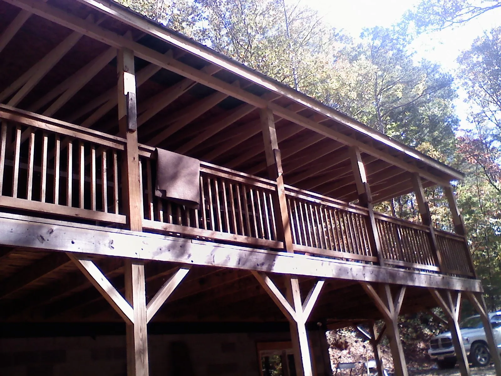 Timber framing under a new elevated porch and deck — Roof Leak Repair in Thomaston by Roofing Brothers